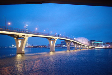 Large bridge illuminated on a winter evening