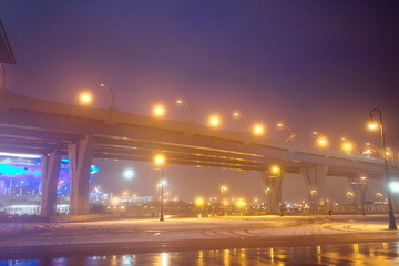 Obraz premium Blurry city lights in winter evening