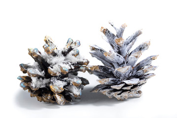 Close-up of pine cones on a white background. Christmas decoration.