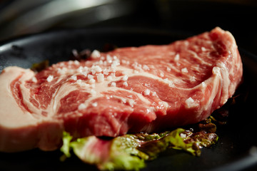 Korean BBQ, meat on iron plate 