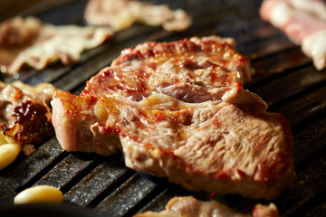 Korean BBQ, meat on iron plate 