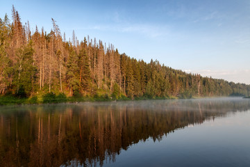 Fototapeta na wymiar Foggy morning on the Chusovaya river.