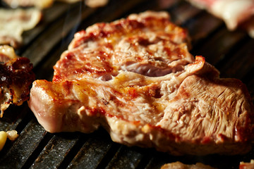 Korean BBQ, meat on iron plate 