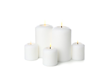 Fototapeta na wymiar Group of different candles isolated on white background