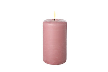 Pink burning candle isolated on white background