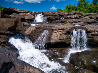 The waterfalls on a sunny day at Tatai in Koh Kong Province in Cambodia