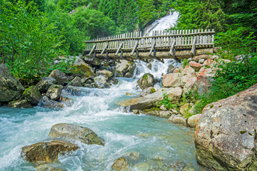 Waterfall in Italian Alps,  Amola cascata, Trentino, Italy