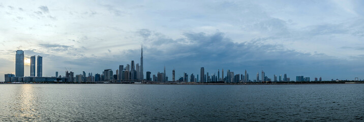 Waterfront view of Burj Khalifa, World Tallest Tower. A view from Dubai Creek Harbour, Residential and Business Skyscrapers in Downtown, Dubai, UAE