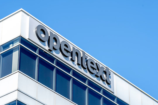 Sign of Open Text on September 30, 2019 in Kitchener, Ontario, Canada, a Canadian company that develops and sells EIM software.