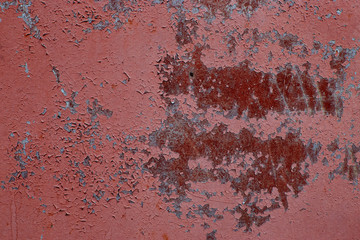 Eroded metal texture with black paint splashes, abstract grunge background