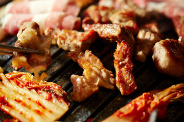 Korean BBQ, meat on iron plate 