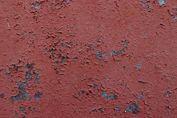 Eroded metal texture with black paint splashes, abstract grunge background