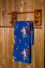 towel on a hanger in a wooden house