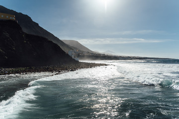 Waves on the rocky coast of Tenerife island, Canary islands, Atlantic ocean, Spain