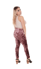 beautiful young woman standing in profile in tights