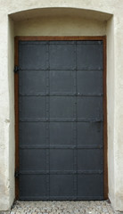 Metal forged medieval door