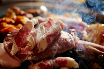 Korean BBQ, meat on iron plate 