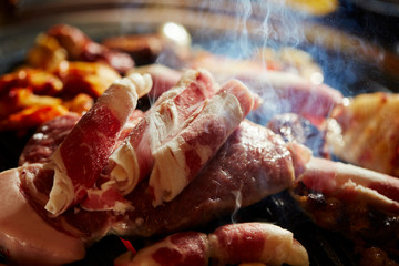 Korean BBQ, meat on iron plate 