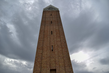 Incoronata Bell Tower by Morning with Cloudy Sky