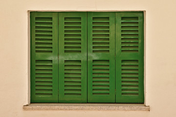 green old window blinds centered