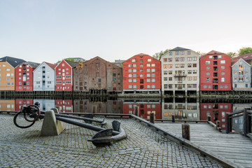 Colorful wooden buildings near Nidelva river in the city of Bakklandet/Trondheim in Norway. Architecture, buildings, travel and photography concept.