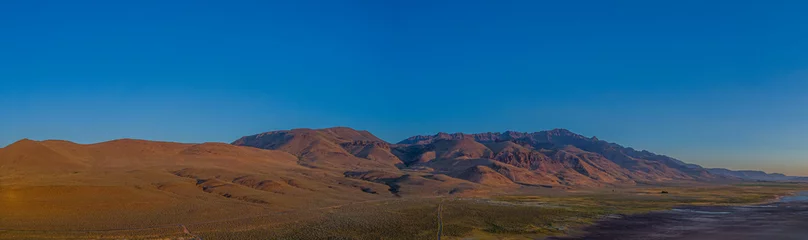 Fotobehang Steens Mountains and the Alvord Desert in Summer time © Cascadia Aerial