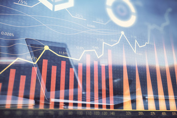 Forex market chart hologram and personal computer background. Multi exposure. Concept of investment.