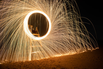 Circles of sparks steel wool