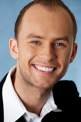 Fototapeta premium Young cheerful businessman