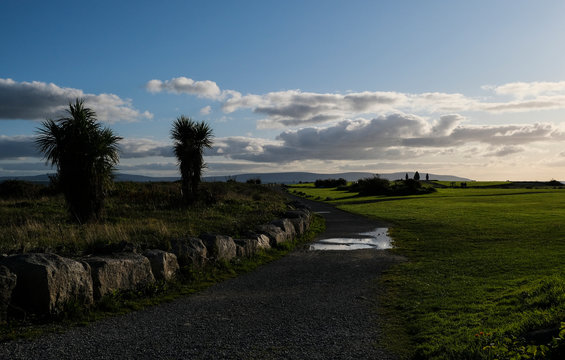 View of Celia Griffin memorial Park along Salthill promenade near Galway, Ireland. Taken on a sunny summer evening.