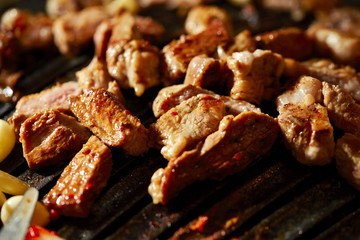Korean BBQ, meat on iron plate 