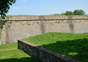 Historic walls on grass in Pamplona, Spain