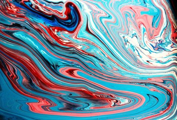 White-red-blue abstract marble background. Acrylic paint flows freely and creates an interesting structure. Background for web design, fabric, design, Notepad cover.