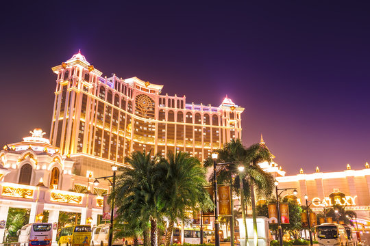 Macau, China - December 8, 2016: night view of colorful Galaxy Macau Resort Hotel Casino in Cotai Strip. Scenic view of Galaxy popular resort complex landmark and lifestyle.