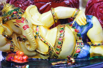 Fototapeta na wymiar Colorful Statue Of Indian Idol Lord God Ganesha Lying
