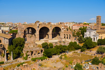 Ruins of the Roman Forum at Palatino hill in Roma, Italy, Europe. Famous travel destination. Italian ancient roman architecture aerial view. Landmarks in eternal city. Summer holidays.