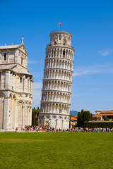 Pisa Cathedral Duomo di Pisa with Leaning Tower on Piazza dei Miracoli in Pisa, Tuscany, Italy. Famous and popular Italian touristic destinations, Basilica of Piza city. Italian summer vacation.