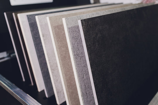 home furnishing store demonstrating variants of stone for kitchen countertop.