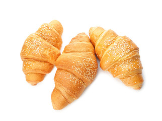 Tasty croissants on white background