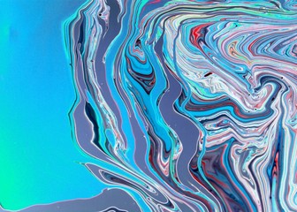 Gray-blue abstract marble background. Acrylic paint flows freely and creates an interesting...
