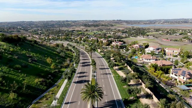 Aerial view of small neighborhood road with residential modern subdivision luxury houses in Chula Vista, California, USA.