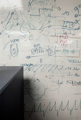 Strategy written on whiteboard in corporate office