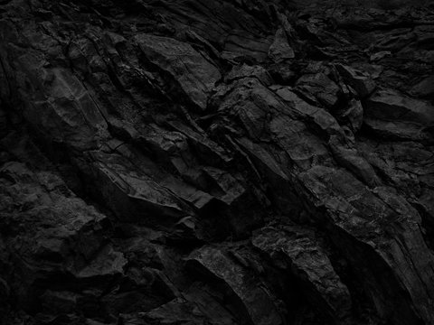 Black and white background. Abstract grunge background. Black stone background. Dark gray rock texture. Distrusted backdrop.