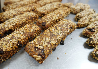 freshly baked granola bars on a metal tray