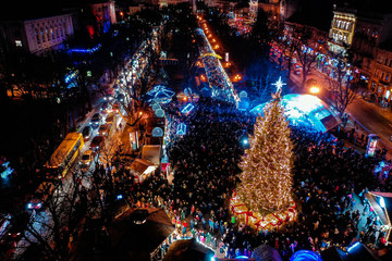Opening of Christmas tree near Opera House in Lviv, Ukraine. View from drone