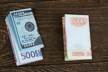 folded dollars, euros and rubles