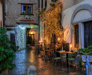 Christmas illuminations spread a romantic light in the medieval alleys.Como - Italy