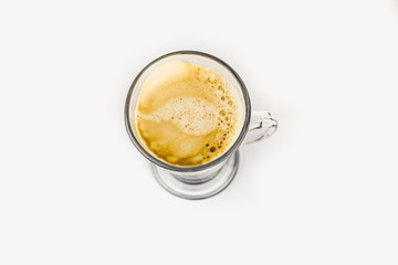 GLASS CUP OF COFFEE ON WHITE BACKGROUND