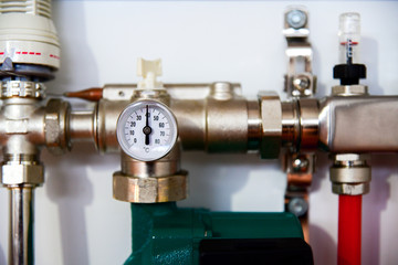 pressure gauge indicates pressure for underfloor heating
