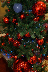 Christmas decorations on the Christmas tree. Red ball.